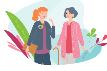 Care Partner walking alongside a female client with a walking stick